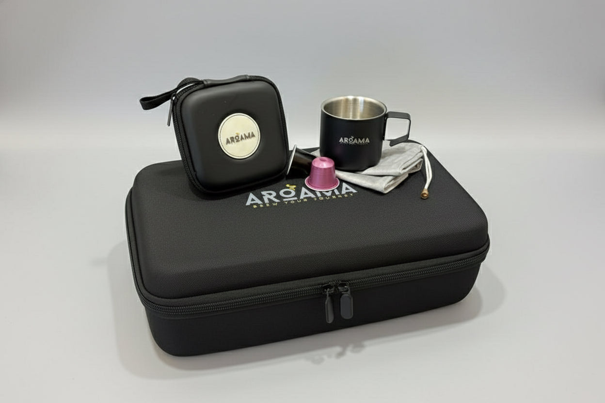 Black Aroama travel case with a mug and other items on a light background