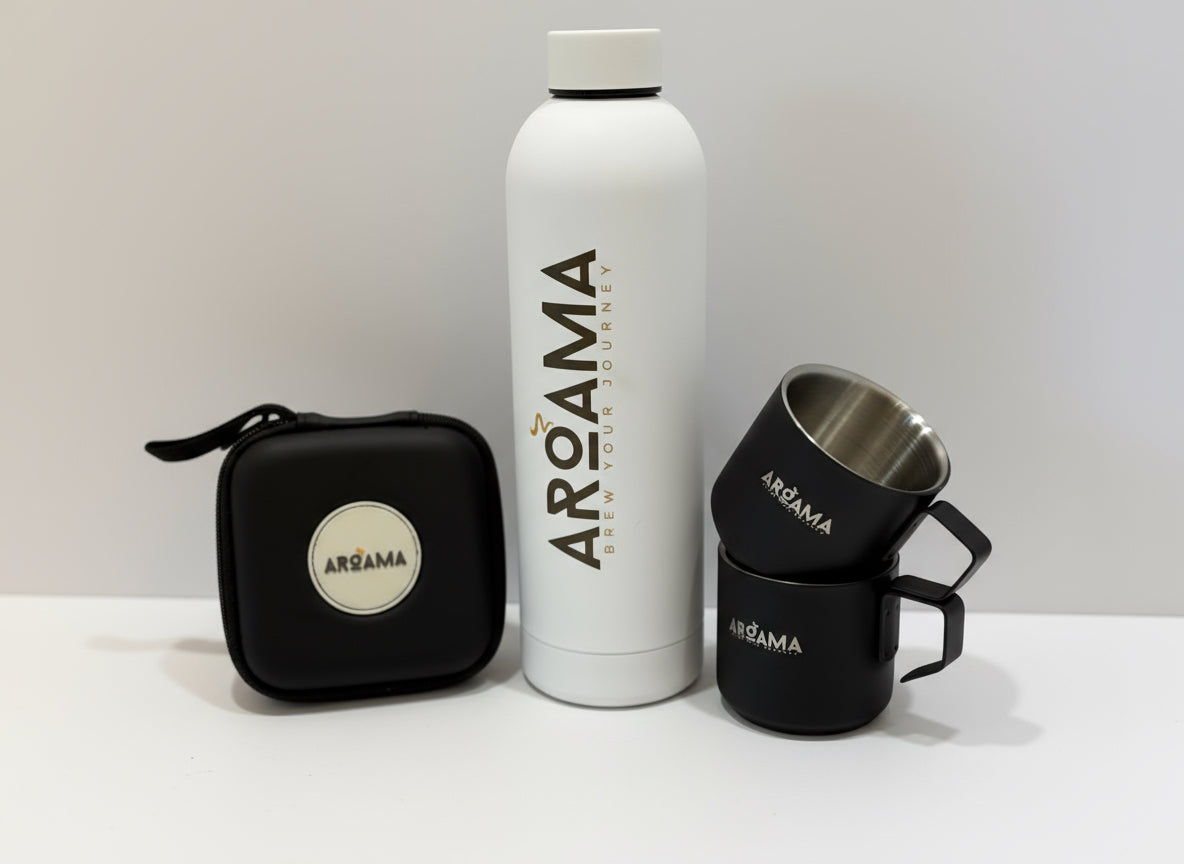 White water bottle, black carrying case, and two black mugs with 'Aroama' branding on a marble surface.
