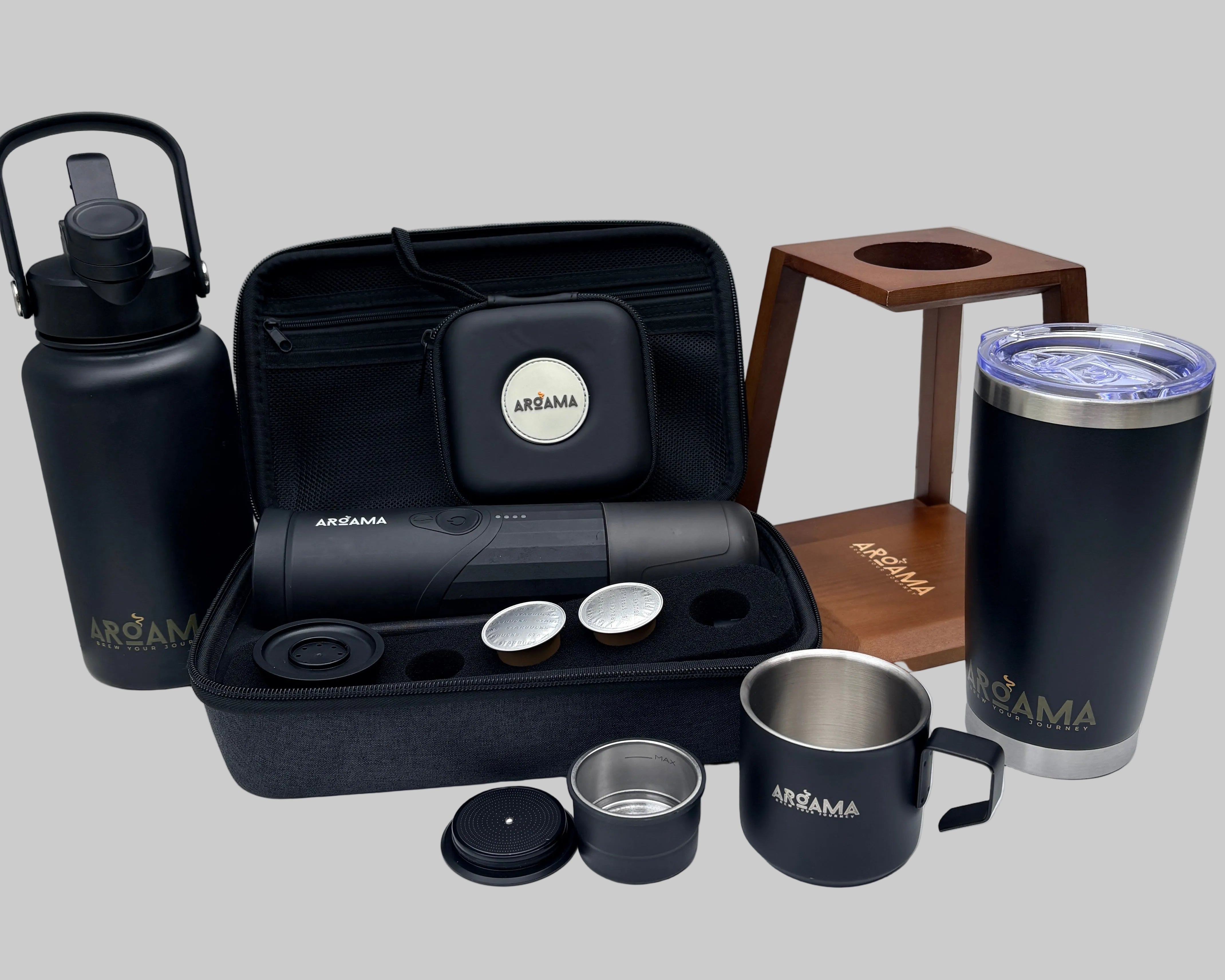 Black travel coffee set with cups, mugs, and a bottle on a white surface.